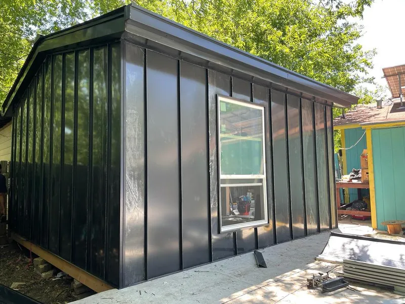 Black standing seam metal wall panels for Roof Inspection in Lyman