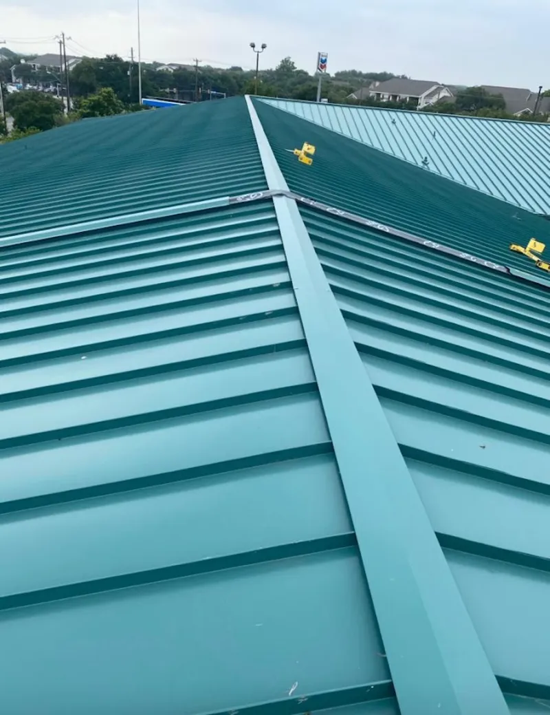 Green commercial metal roof ridge and valley for Metal Roof Repair in Lyman